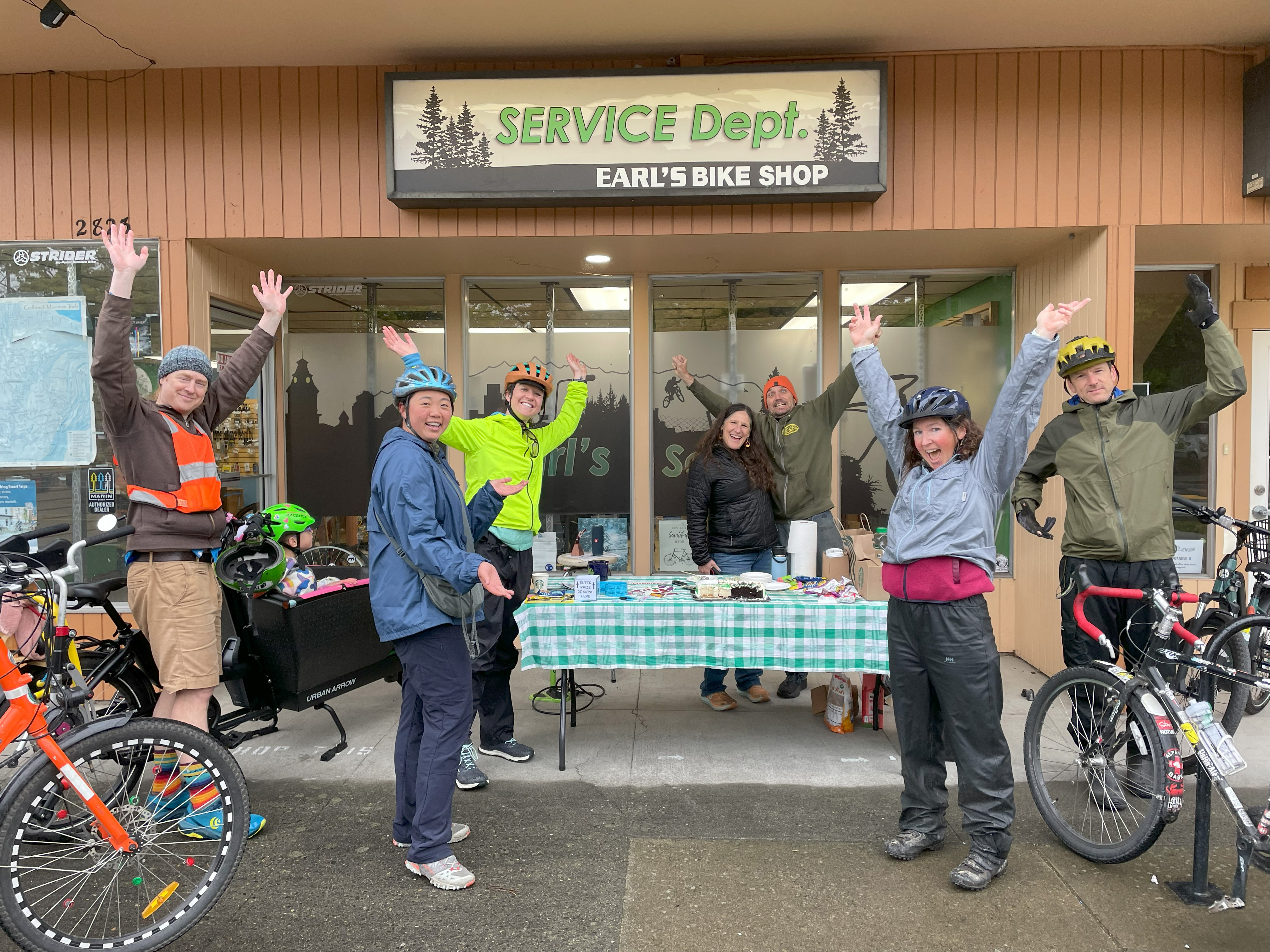 People in front of a bike shop